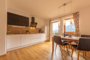Kuchyň nebo kuchyňský kout v ubytování Residence Tamperhof