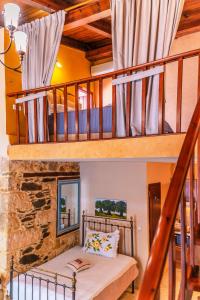 Ένα ή περισσότερα κρεβάτια σε δωμάτιο στο Ξενώνας Ηδύλη