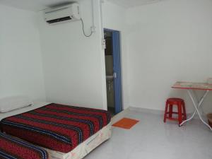 Postel nebo postele na pokoji v ubytování ET Budget Guest House