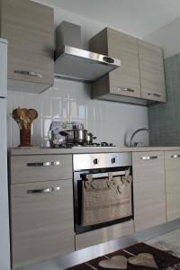 A kitchen or kitchenette at Salento Roots Apartment