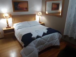 Cama ou camas em um quarto em Pousada Green House