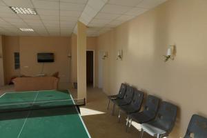 a conference room with a glass table and chairs at Sun Village Villa 13 in Byala