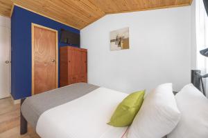 Postel nebo postele na pokoji v ubytování Hotel Casa Normandia