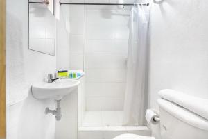 Koupelna v ubytování Hotel Casa Normandia