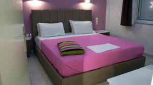 A bed or beds in a room at Studios Magda