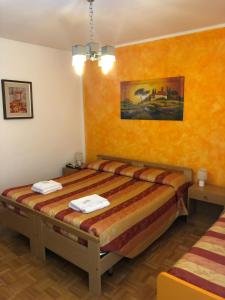 Postel nebo postele na pokoji v ubytování Miramonti Hotel