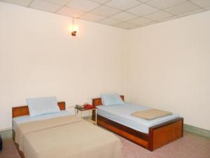 Krevet ili kreveti u jedinici u objektu Sengdara Hotel