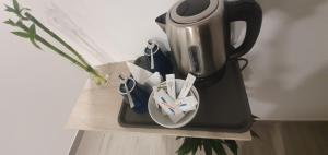 Coffee and tea making facilities at Hostal Pio Centro