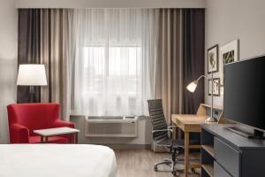 Μια τηλεόραση ή/και κέντρο ψυχαγωγίας στο Country Inn & Suites by Radisson, Byram-Jackson South, MS +41 φωτογραφίες