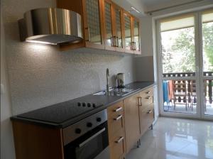 Kuchyňa alebo kuchynka v ubytovaní Apartamenty Skaldowie
