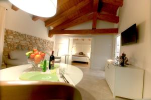 TV a/nebo společenská místnost v ubytování Agriturismo Villa Trovatore