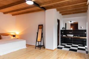 Postel nebo postele na pokoji v ubytování Hotel Posta