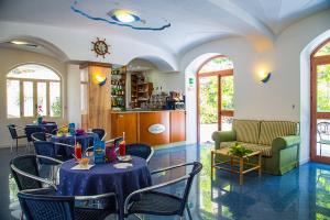 Гостиная зона в Hotel La Mandorla