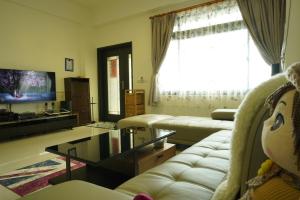 TV a/nebo společenská místnost v ubytování TiAmo B&B Yilan