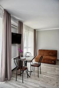 Posezení v ubytování Apart Reserve Sloboda Loft + 8 fotografií