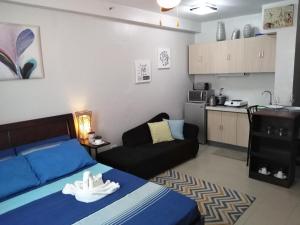 Eldhús eða eldhúskrókur á Mak'z Condo Place