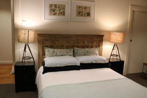 A bed or beds in a room at Nyima Tashi Buddhist Centre