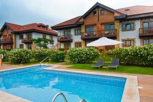 Πισίνα στο ή κοντά στο Apartamentos Ciudad de Petra
