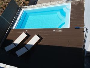 Bazén v ubytování Elena Village Hotel & Suites nebo v jeho okolí