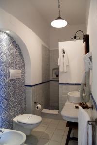 Koupelna v ubytování Quartara Boutique Hotel