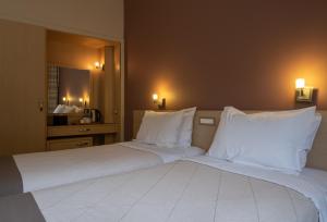 Cama o camas de una habitación en Acropolis View Hotel