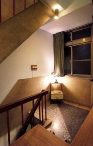 Un lugar para sentarse en 台南謝宅 Old House Inn