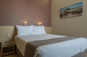 Cama o camas de una habitación en Acropolis View Hotel