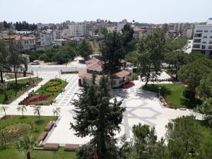 an aerial view of a park in a city at Guckar Sehrinn Oteli in Serik