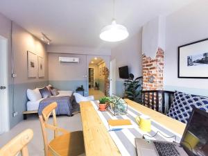 TV a/nebo společenská místnost v ubytování Snoozy Guesthouse