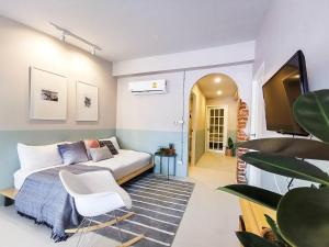 TV a/nebo společenská místnost v ubytování Snoozy Guesthouse