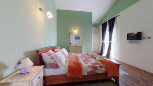 A bed or beds in a room at Villa Melody Novalja