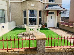 Κήπος έξω από το The Snug Garden Apartment