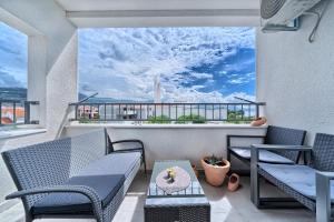 Posedenie v ubytovaní Modern apartments with sea view 150 meters to beach