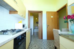 Kuchyňa alebo kuchynka v ubytovaní Corte Coronisio B&b