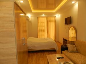Postel nebo postele na pokoji v ubytování Hotel BellMar