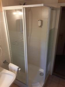 Ein Badezimmer in der Unterkunft Hotel Feiler