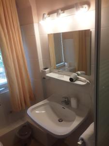 Ein Badezimmer in der Unterkunft Hotel Feiler
