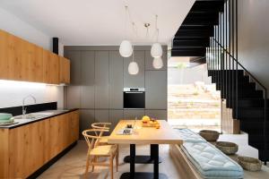 Kuchyňa alebo kuchynka v ubytovaní Amantes Villas and Suites
