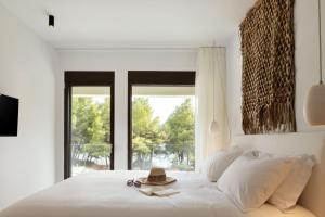 Posteľ alebo postele v izbe v ubytovaní Amantes Villas and Suites + 37 fotografií