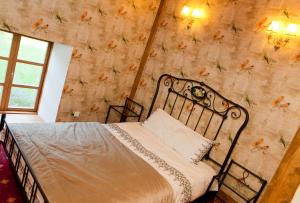 Postel nebo postele na pokoji v ubytování Linnumaja Guesthouse