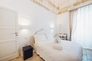 Postel nebo postele na pokoji v ubytování Giovì Relais