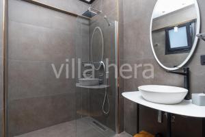 a bathroom with a sink and a mirror at Villa Hera Hisaronu/ Oludeniz/ Fethiye in Fethiye +18 photos