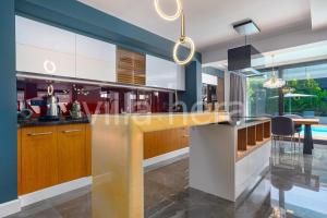 a kitchen with a large island in a house at Villa Hera Hisaronu/ Oludeniz/ Fethiye in Fethiye