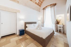 Postel nebo postele na pokoji v ubytování Giovì Relais