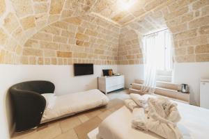 Postel nebo postele na pokoji v ubytování Giovì Relais