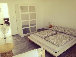 Posteľ alebo postele v izbe v ubytovaní APPART SOMA