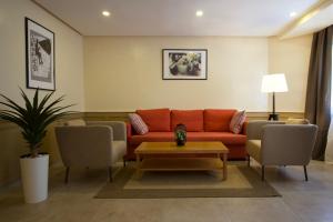 Кът за сядане в Suite Loc Luxury Aparthotel