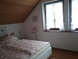 Ferienwohnung Kienscherf tesisinde bir odada yatak veya yataklar