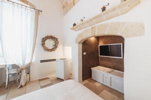 Postel nebo postele na pokoji v ubytování Giovì Relais