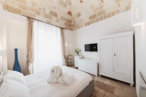 Postel nebo postele na pokoji v ubytování Giovì Relais